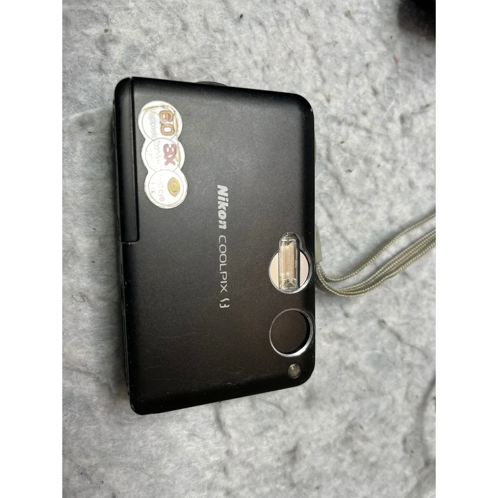 Nikon Coolpix S3 6.0MP Digital Camera Black with Dock MV-11 and AC Adapter EH-63